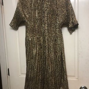 A fancy brown and gold dress